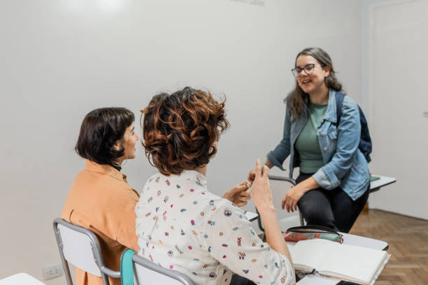 istock Student friends talking in the classroom 2169625605