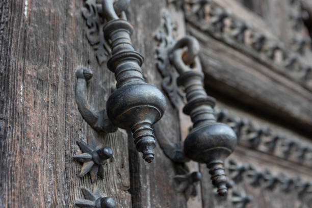 August 28, 2024: Madrid, Spain. Antique door knocker in Madrid. Walking through the streets of Madrid, you can still find beautiful details from the past, like this door knocker. We found it near Calle Mayor, on the way to Puerta del Sol.
