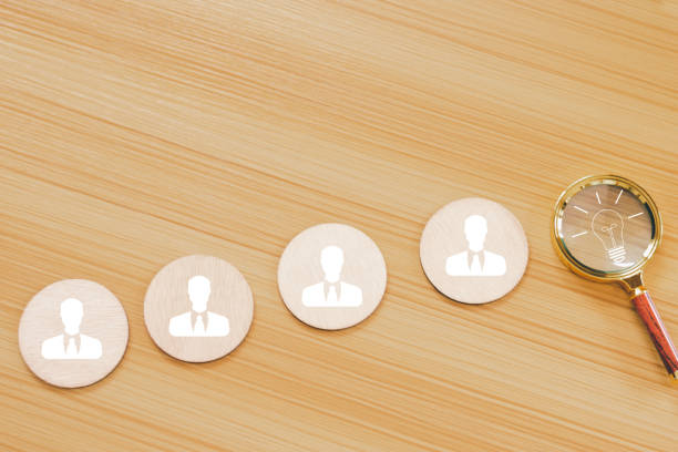 istock Magnifying glass with light bulb icon, representing the search for ideas, creativity, problem solving. 2169628920