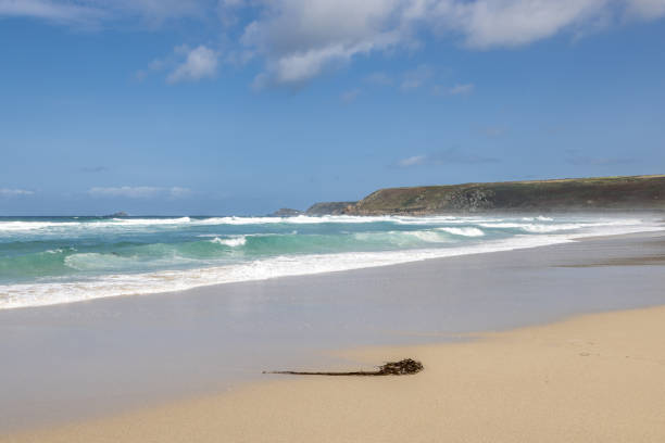 An idyllic view over the beach at Sennen on the Cornish coast, on a sunny summer's day
