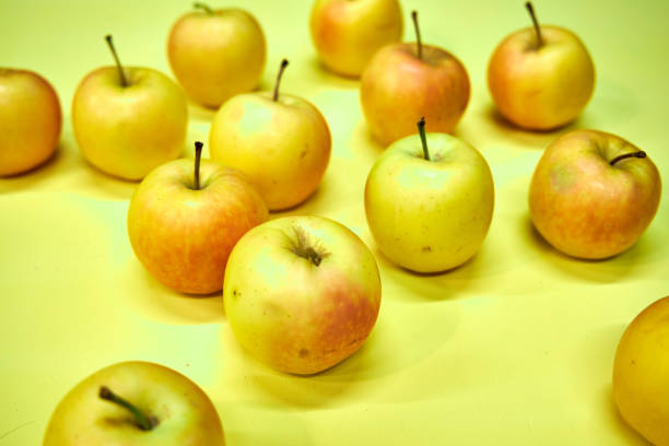 Close-up of a sliced apple on a wooden table