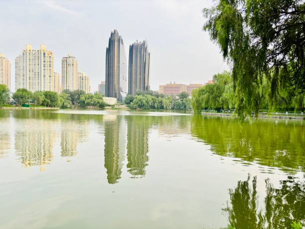 istock Building with reflection in the water , Lake view with building shadow. 28 August,2024 2169638428