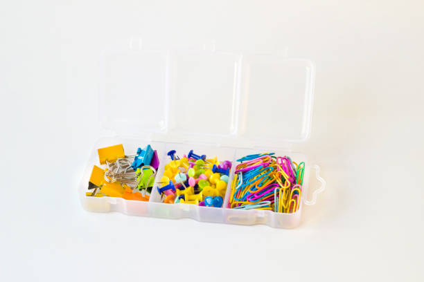 istock Colorful paper clips and tacks in a box 2169648802