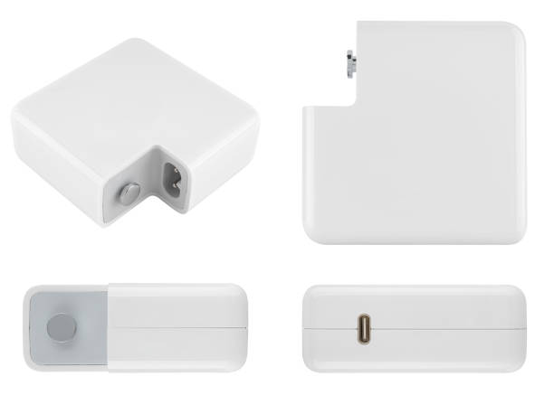 istock Laptop power adapter, on white background in insulation 2169653826