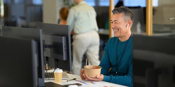 istock Professional Asian Businessman Engaging in Video Conference 2169658747