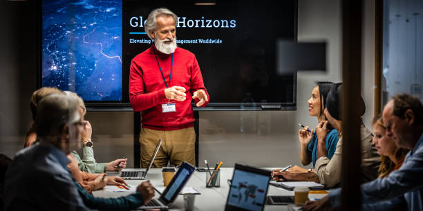 istock Senior Business Professional Conducting Presentation 2169658756