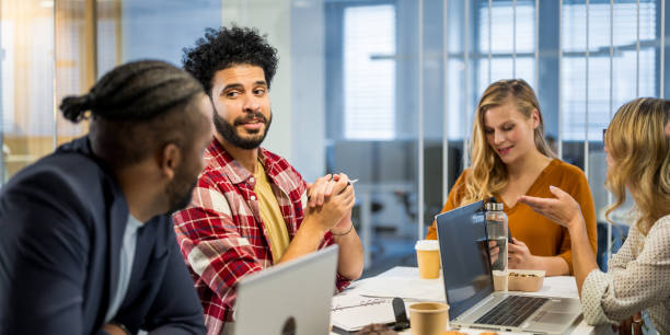 istock Diverse Team Engaging in Strategy Discussion at Office 2169658769
