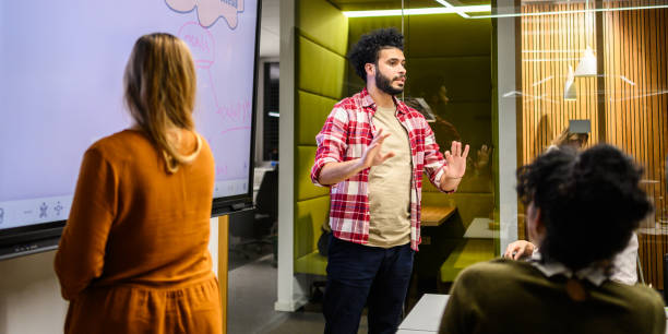 istock Diverse Team Engagement in Office Presentation 2169658772