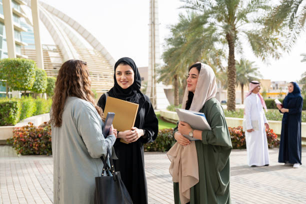 istock Diverse female friends talking together on university campus 2169658813