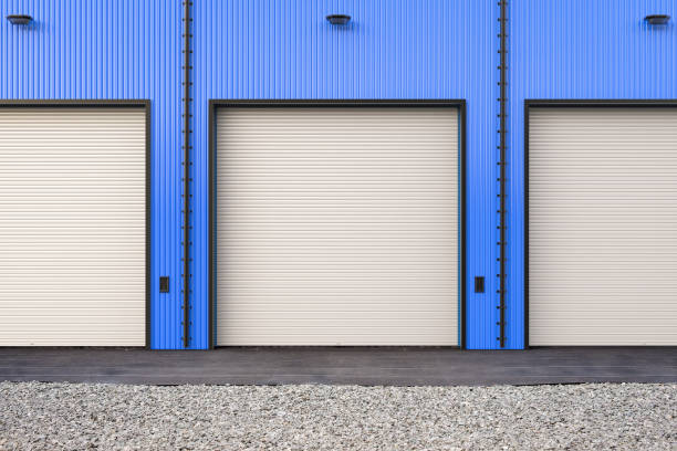 istock Blue warehouse exterior with shutter doors 2169659082