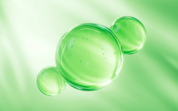 istock Abstract green glass spheres, blue cells, 3d rendering. 2169660675