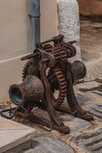 istock Krk Croatia 26.06.24 An old rusty engine on a historic street 2169660806