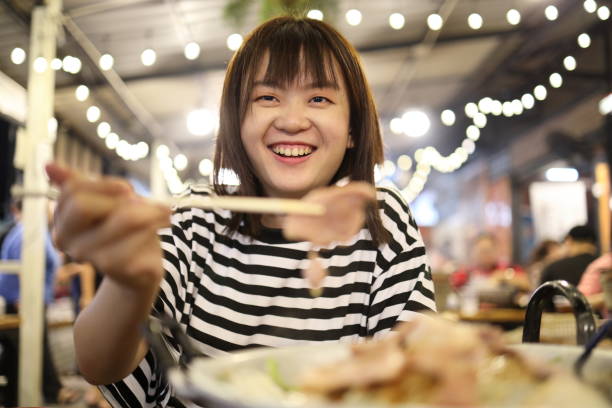 istock 20s Asian woman 2169666731