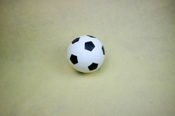 istock a small white and black toy rubber ball 2169673072