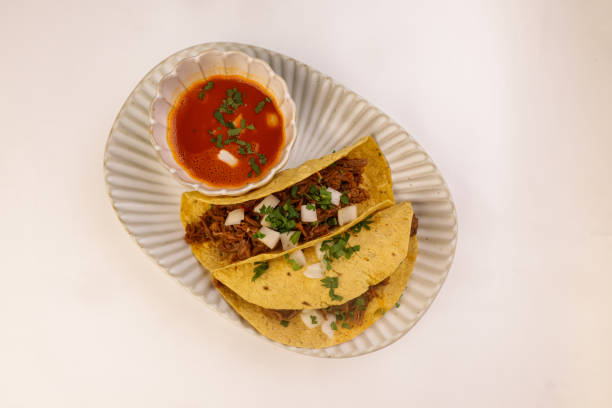 istock Corn Tortilla Birria Taco with Sauce. 2169677922