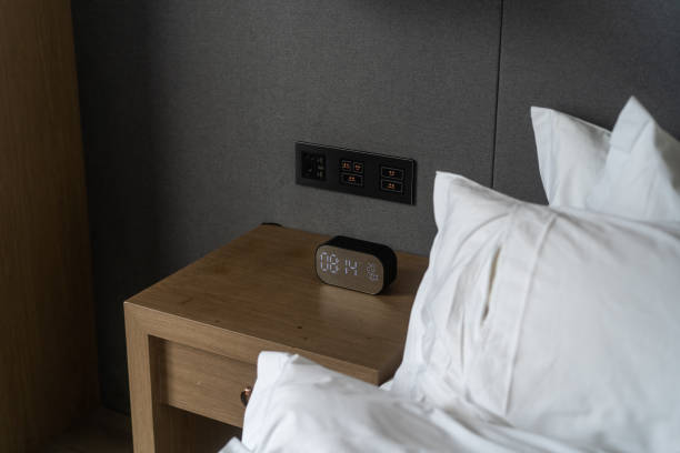 istock bed in bedroom of hotel 2169686740