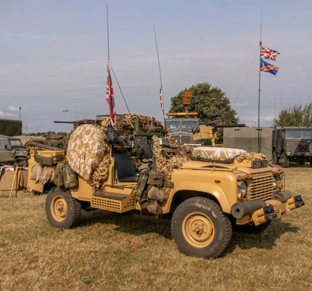 Close up of military jeep Forncett St Peter, Norfolk, UK - August 18 2024. Military jeep and off road vehicle used in desert warfare on display at a public exhibition and war re-enactment jeep 4x4 off road vehicle world war ii stock pictures, royalty-free photos & images