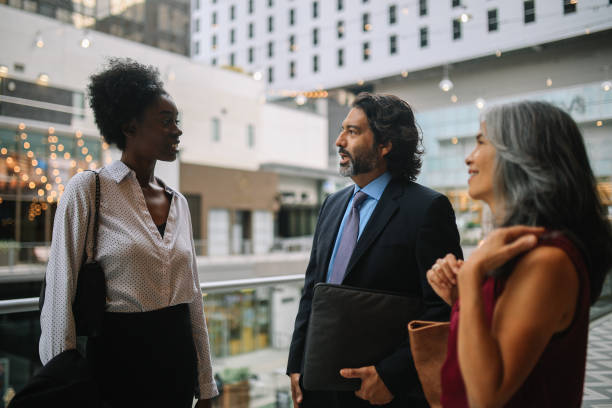 istock Colleagues talking after work in Los Angeles 2169689725