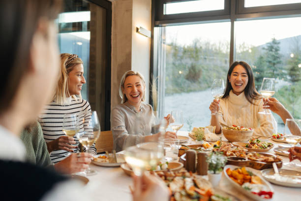 istock Group of people celebrating Thanksgiving together 2169692143