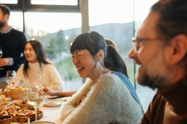istock Group of people celebrating Thanksgiving together 2169692203