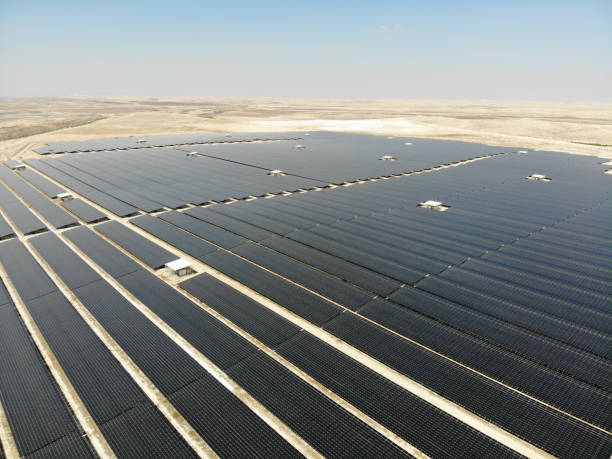 istock Solar panels power station desert aerial view 2169693527
