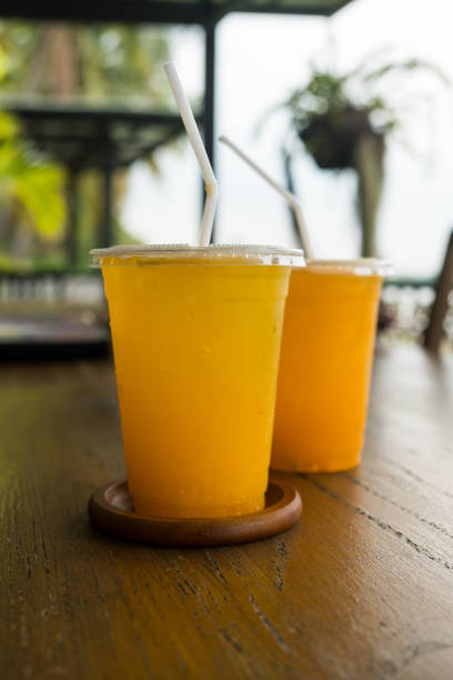 istock Orange juice and passion fruit juice. 2169694677