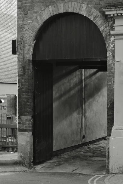 istock Light and shadow through the door 2169705173