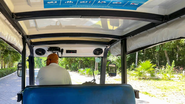 Cancun, Mexico: June 26, 2024: Embark on a delightful journey through our Caribbean paradise aboard our stylish golf carts. Discover hidden gems and breathtaking views in comfort and style.