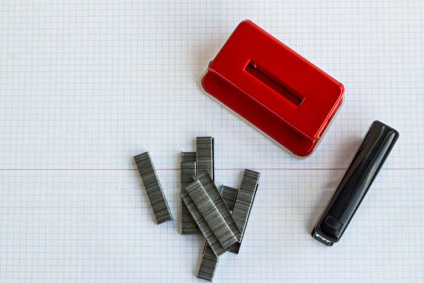 Compact stapler, desk accessory, office tool, paper fastening, stationery, small, portable, durable, convenient, workspace essential, school supply, precise, practical, metal, ergonomic.