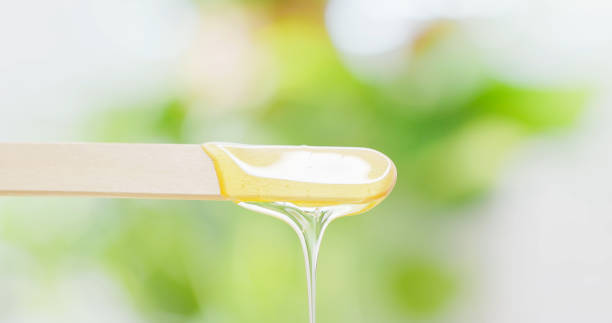 istock a wooden stick wax  dropping 2169711348