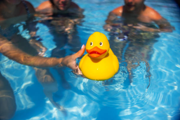 istock Yellow rubber duck in the swimming pool 2169711404