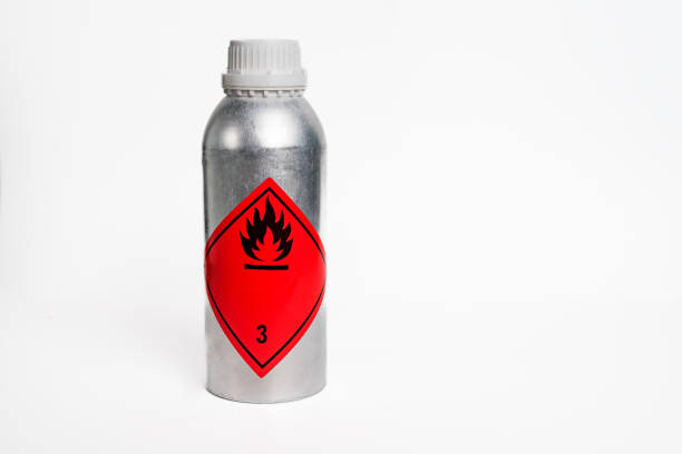 Aluminum bottle for sampling with flammable liquids label.