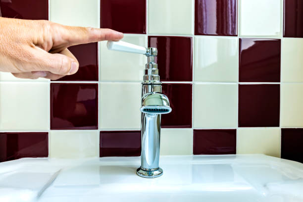 Washbasin in a tiled bathroom