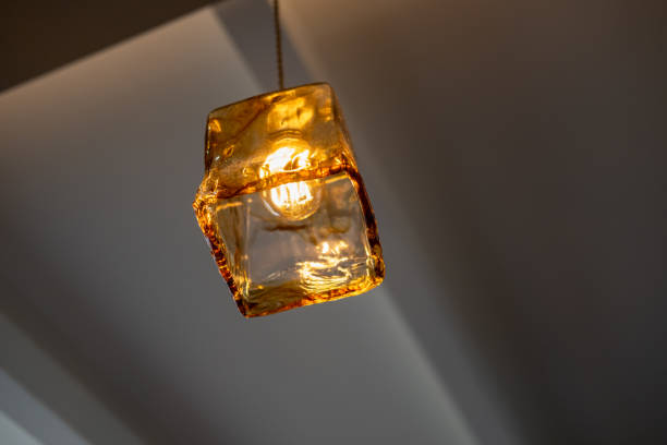 istock Hanging Edison light bulb, also known as filament light bulb. with glass shade 2169715978