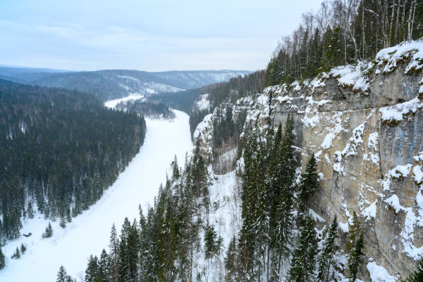 istock Ural River Usva. Winter landscape, snow rocks, hike. Magical winter forest. 2169718075