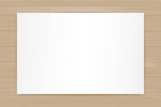istock Paper note on wooden table. Realistic white page on wood textured background. Vector mockup 2169722283