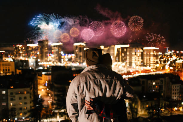 Couple watching New Year's Eve fireworks