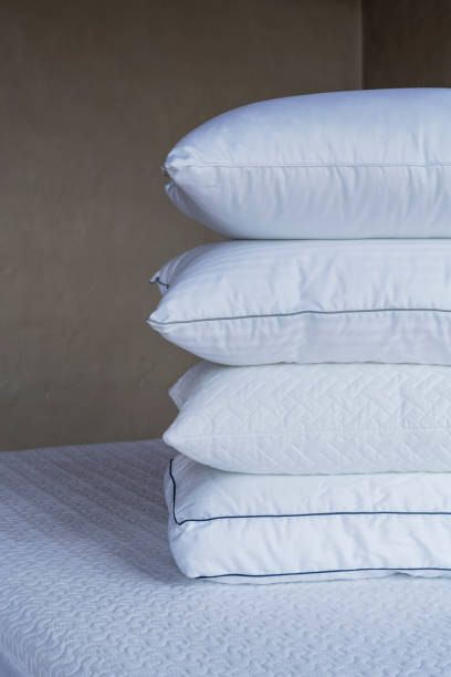 istock Beautiful Bed Pillow Arrangement 2169726236