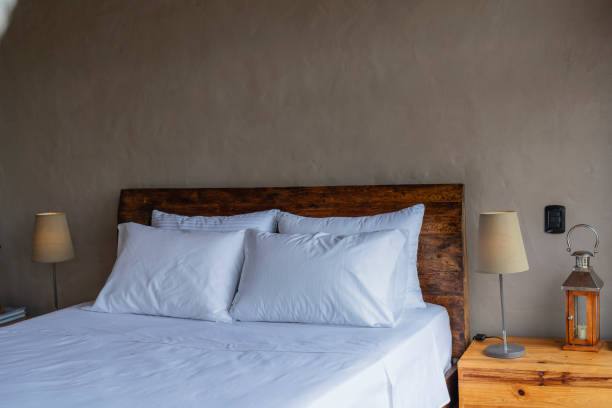 istock Beautiful Bed Pillow Arrangement 2169726653