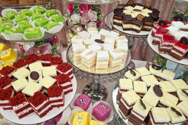 istock Candy bar with different assortments of cakes at a wedding 2169729002