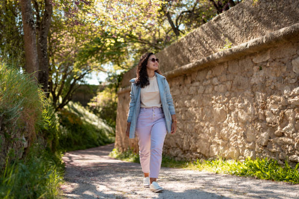 Tourist walking alone in nature in Palmela, Portugal
