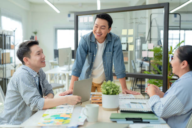 istock Ideas sharing engineer team meeting brainstorm internal meeting presentation, teaching and corporate, men and women. Documents, manager and graphs for financial stats, accountants and finance in office, laptop and strategy 2169732055