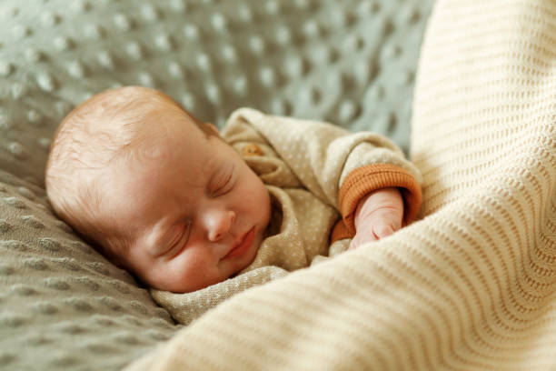 istock Cute Baby, Brothers, lying on his back 2169733852