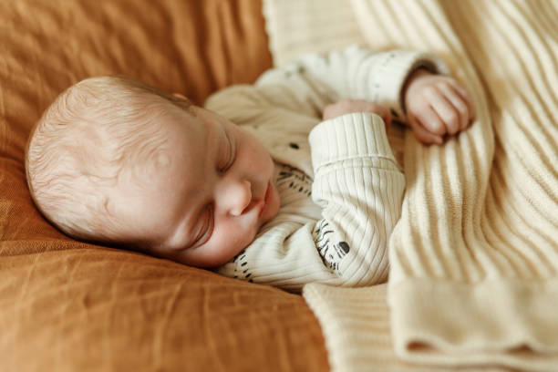 istock Cute Baby, Brothers, lying on his back 2169733865