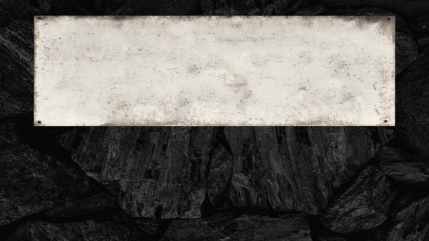 istock Metal sign in front of a coal wall with empty space for text 2169739084