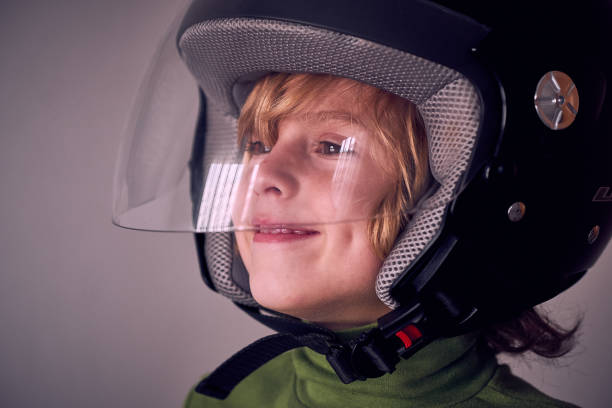 istock Happy little boy in safety helmet 2169739364