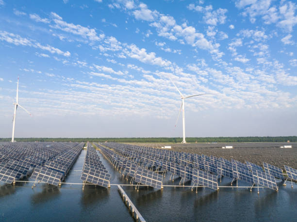 istock solar power station and wind mill 2169742775
