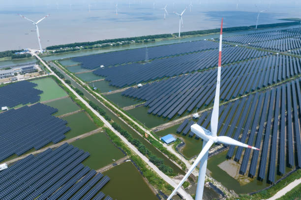 istock solar power station and wind power station 2169744449