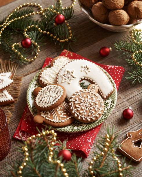 istock Gingerbread Christmas cookies decorated with white icing 2169744639