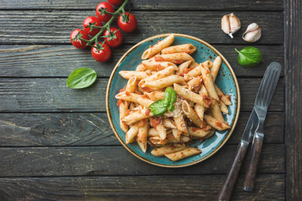 istock Penne pasta in tomato sauce 2169744669